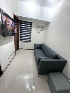 new 1 bedroom next to robinsons galleria with 200mbps internet